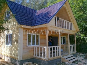 Загородный дом из бруса на ленточном фундаменте